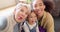 Happy family, tongue out and selfie on sofa with mother, grandmother and girl child in their home. Face, love and