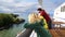 Happy family, tourists sailing on cruise ferry through the Baltic Sea passing by the Vallisaari Island