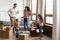 Happy family with two daughters celebrating moving day