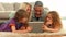 Happy family using tablet together