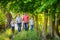 Happy family on a walk in a beautiful evening park