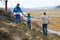 Happy family walking in the mountains