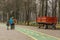 Happy family walking in the park in wintertime