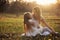 Happy family walks in the spring meadow