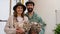 happy farmer couple holding blocks of oyster mushrooms