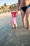 Happy father and adorable little girl at beach. Persian Gulf ,Dubai.