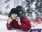 Happy father with his son outside with snowman