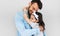 Happy father hold embrace his cute daughter. Loving daddy and his little girl cuddling and enjoying time together. Childhood and