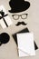Happy Father`s Day background, card. Funny hat, glasses and moustache, coffee cup, gifr or present, notebook mock up