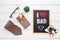 Happy Father's day concept. Flat lay image of gift box, necktie, glasses, rose flower and chalkboard with I Love Dad text