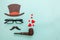 Happy Father\'s day concept. Sign of hat mustache with pipe glasses red heart  on pastel blue background. Man silhouette