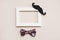 Happy Father`s Day.White frame with bow tie and false mustache