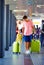 Happy father and son are going for boarding on airplane, summer vacation