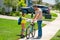 Happy Fathers day. Father teaching son riding bike. Father helping excited son to ride a bicycle in american