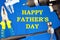 Happy fathers ` day-festive greeting lettering and frame made of locksmith tools for design and decoration.  Impact hammer, plier