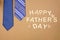 Happy Fathers Day message with blue neck ties over brown paper
