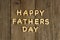 Happy Fathers Day message on wood