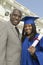 Happy Female Graduate With Father