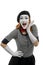 Happy female mime on white background. Vertical portrait of actress