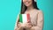 Happy female student headphones holding Italian book, online seminar, knowledge