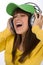 Happy female teenager enjoy music with headphones