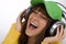 Happy female teenager enjoy music with headphones