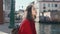 Happy female tourist during the summer vacation. Pretty asian woman enjoying the river view from Italian bridge in