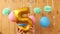 Happy fifth birthday with golden number five 5 balloons and colorful decorations