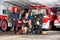 Happy Firefighter\'s Team With Equipment At Fire