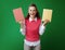 Happy fit student woman showing two red and yellow books