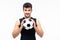 Happy football player holding soccer ball