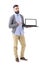 Happy friendly stylish man advertising blank white laptop screen