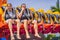 Happy friends in amusement park on a summer day