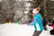 Happy friends having snow fighting and fun in snowy mountain