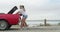 Happy, friends open trunk and skateboard at beach, smile and bonding outdoor. Girls, women on car boot and skating