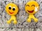 Happy fun yellow smiling emoji couple with peace sign