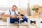 Happy Furniture Assembler In Blue Coverall Fixing Shelf Indoor