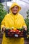 Happy gardener with crops