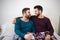 Happy gay men couple having tender moments together at home - Focus on right man