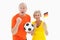 Happy german couple cheering at camera holding ball