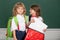 Happy girl and boy school friends. Face portrait of two schoolkids. School friends learning together. Children couple at