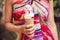 Happy girl enjoy eating with icecream on playground.