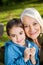 Happy Girl With Grandmother At Campsite