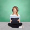 Happy girl with headphones showing tablet pc