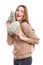 Happy girl holding money fan in hands on white background
