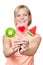Happy girl with lollipop heart,watermelon and kiwi fruit