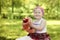 Happy girl playing with Teddy Bear