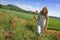 Happy girl on poppies field