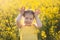 Happy girl in seed field