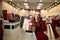 Happy girl shopping gifts in mall on christmas sale. New year holidays shopping idea concept. Smiling woman with